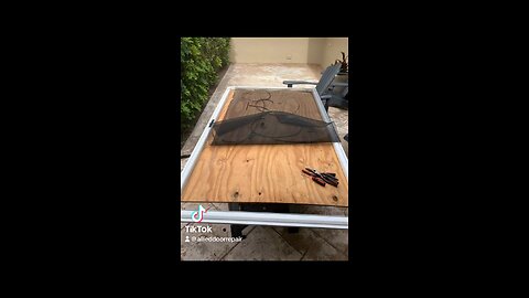 Sliding screen door rescreening in Boca Raton, Fl.