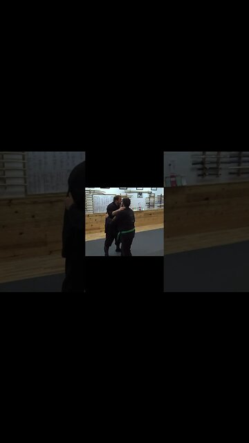 Use gravity and position to take his balance.