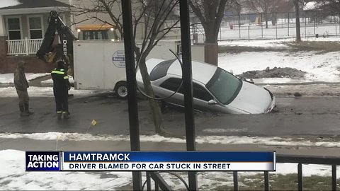 Viral photo of car in 'pothole' is from Hamtramck