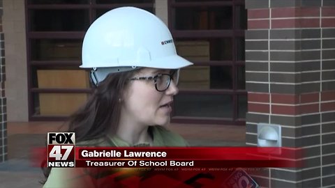 Lansing school board holds meeting at construction site for new high school
