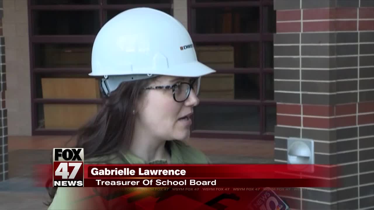 Lansing school board holds meeting at construction site for new high school