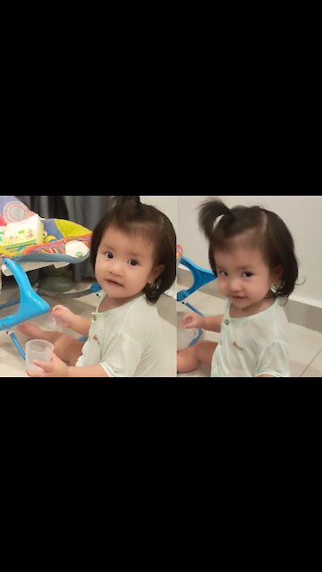 This little girl is so cute, she's learning to talk, everyone