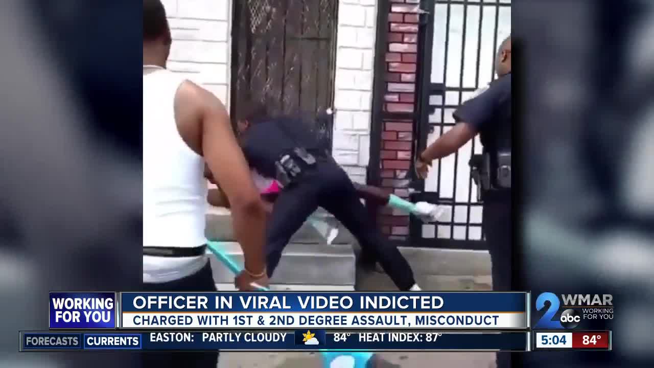 Baltimore officer seen in viral punching video charged
