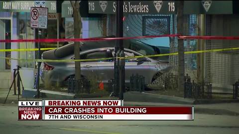 Car crashes into building on Wisconsin Avenue in downtown Milwaukee