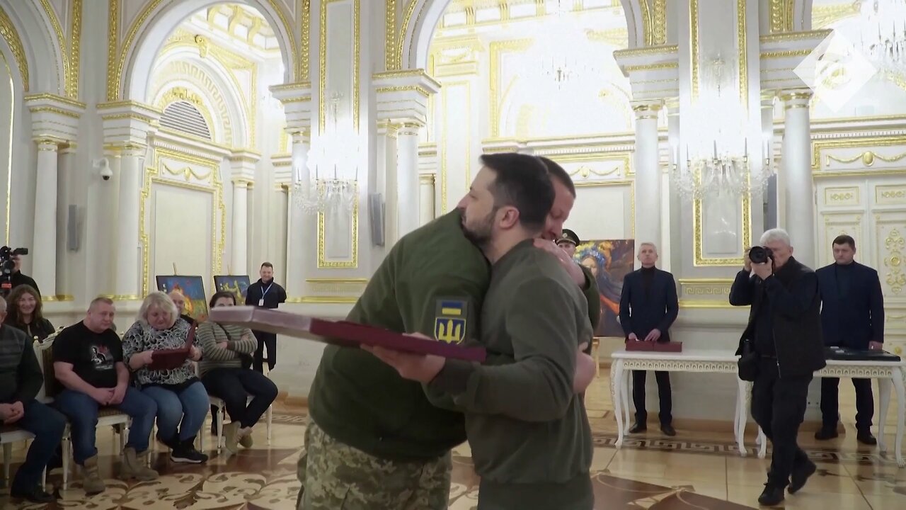 After such a "hug" Zelensky should watch his back... seriously!