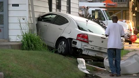 Car crashes into house on northwest side