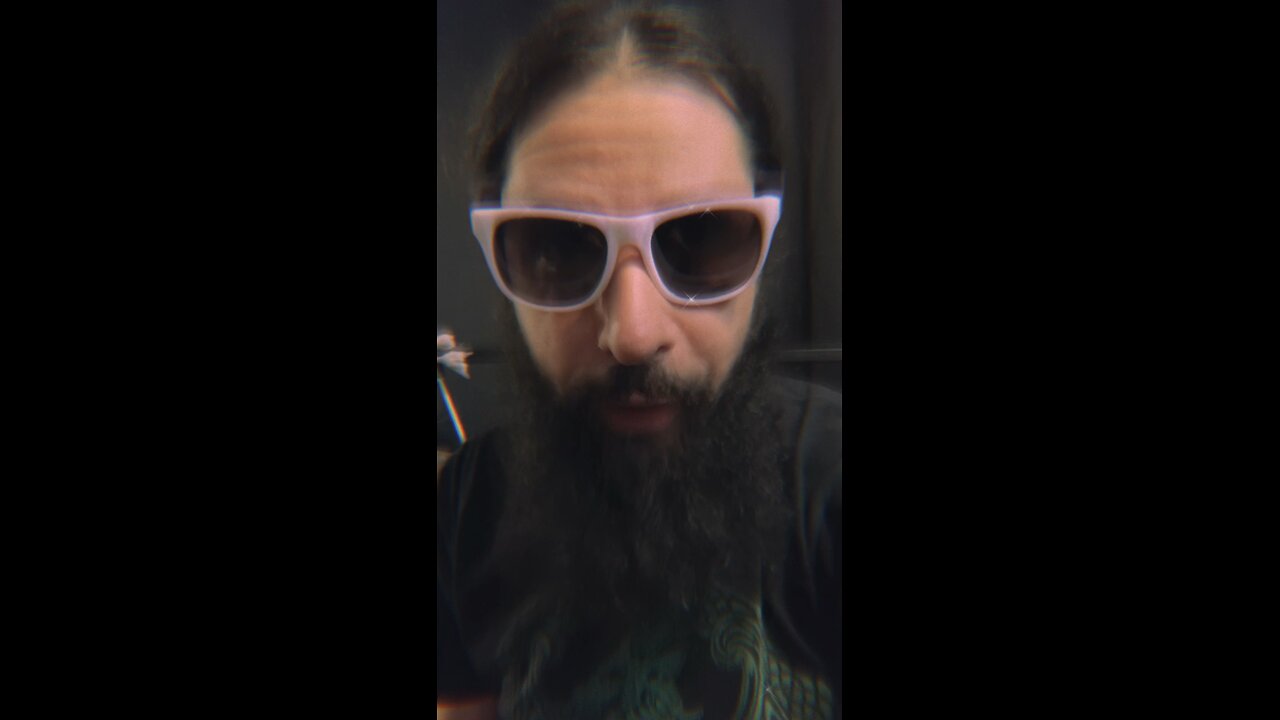 Athan Phynix between two gongs