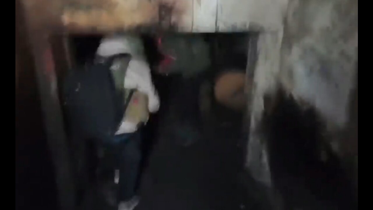 Russian soldiers and reporters escape a Ukrainian bomb attack