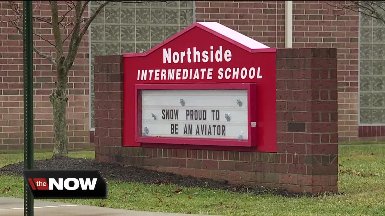 Stark County mother after posting school threat