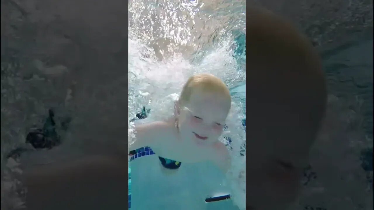 Baby Trying to Dive into the Pool