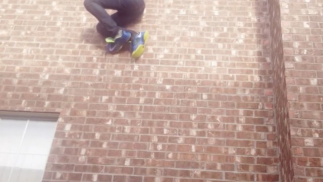 Bad Idea: Guy Climbs Out Window Using Shoelaces