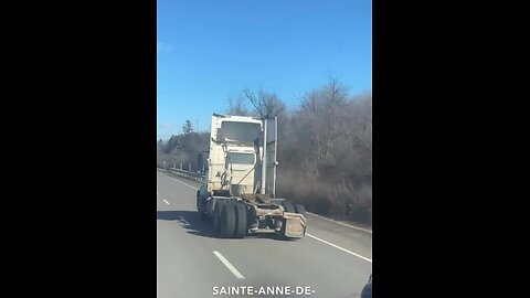 Transport Truck Driving Without Mudflap In Quebec