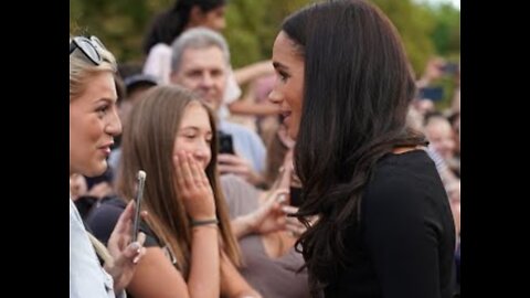 Meghan Markle embraces Queen Elizabeth II mourner