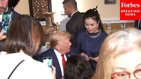 Donald Trump Signs Autographs For Fans During Campaign Stop In Virginia