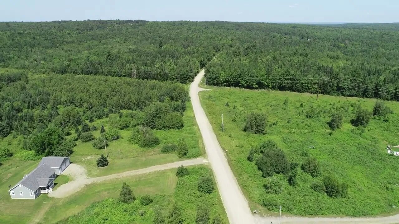 Up up and away, drone flight to power lines on beautiful July day