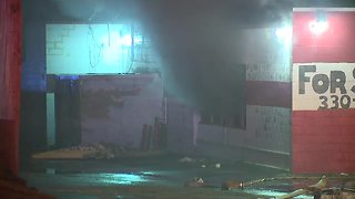 Firefighters battle fire at former Akron bowling alley
