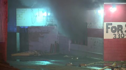 Firefighters battle fire at former Akron bowling alley