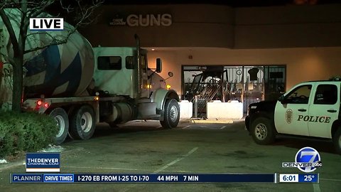 Cement truck crashes into gun store