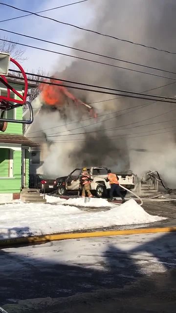 VIDEO: Crews battle house fire in Akron