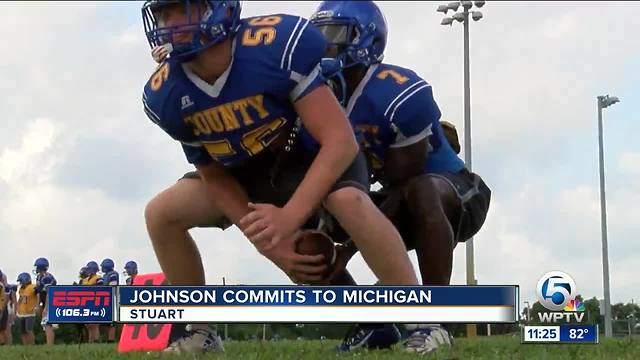 Johnson commits to Michigan