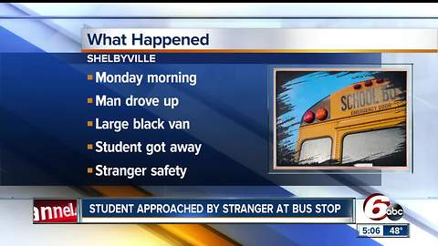 Stranger approaches student at bus stop in Shelbyville