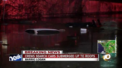 Cars submerged on Barrio Logan street