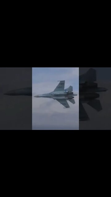 Russian Su- 27 follows A Cruise Missile over water