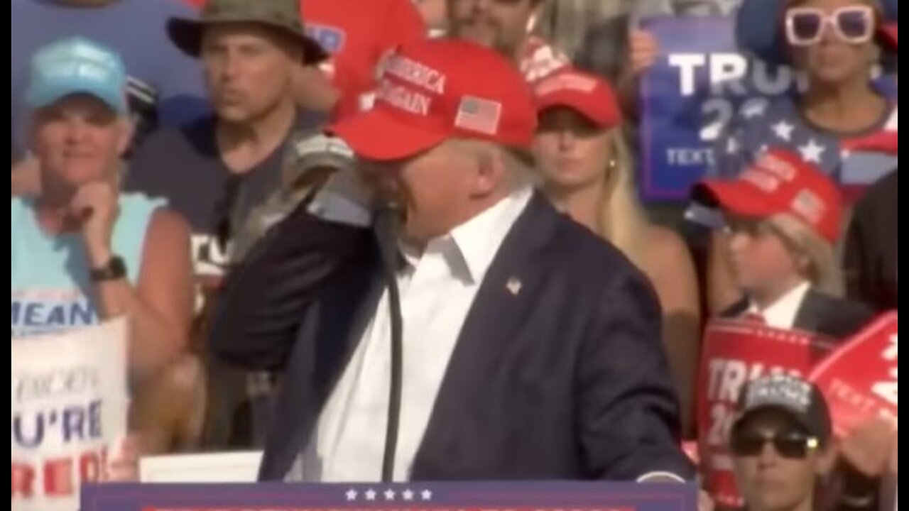 Trump grabs ear, drops to ground after being shot at rally