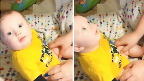 Funny Little Baby Playing With His Mom In The Crib