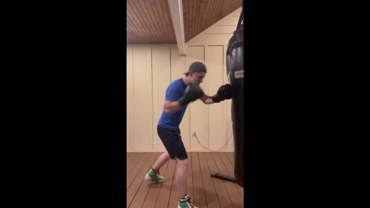 ￼ Power punches on heavy bag #short #boxing #titusellison