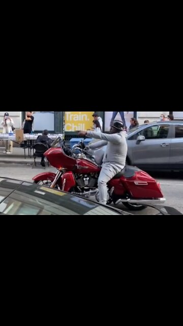 NYC man on motorcycle sings his heart out