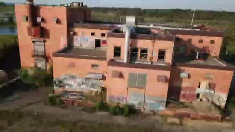 Drone flight over the Jersey Shore Bay to an abandoned building and back