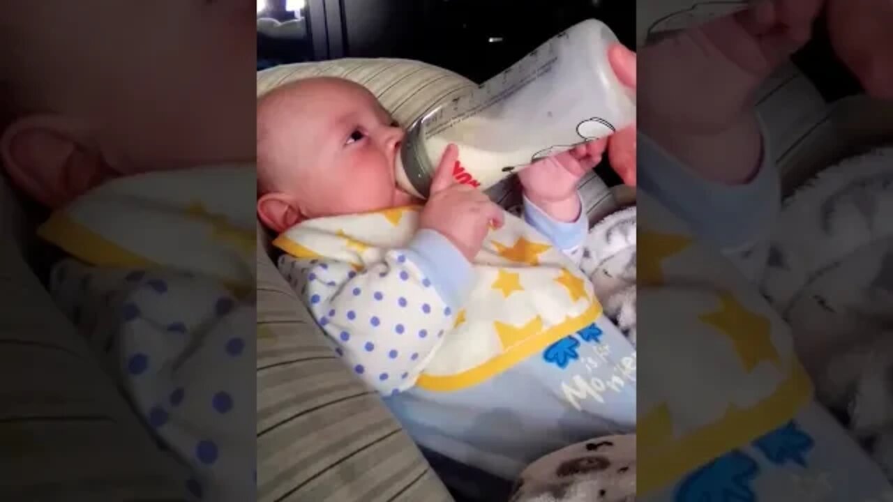 Cute Baby Boy Drinking Milk Bottle