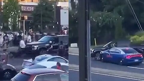 Trucker drives through crowd of people fleeing cops!