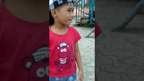 two kids playing in the playground of new Corella Davao Del norte