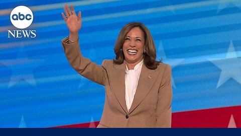 Kamala Harris enters the arena on opening night of the DNC