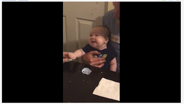 Infant laughs out loud for the first time