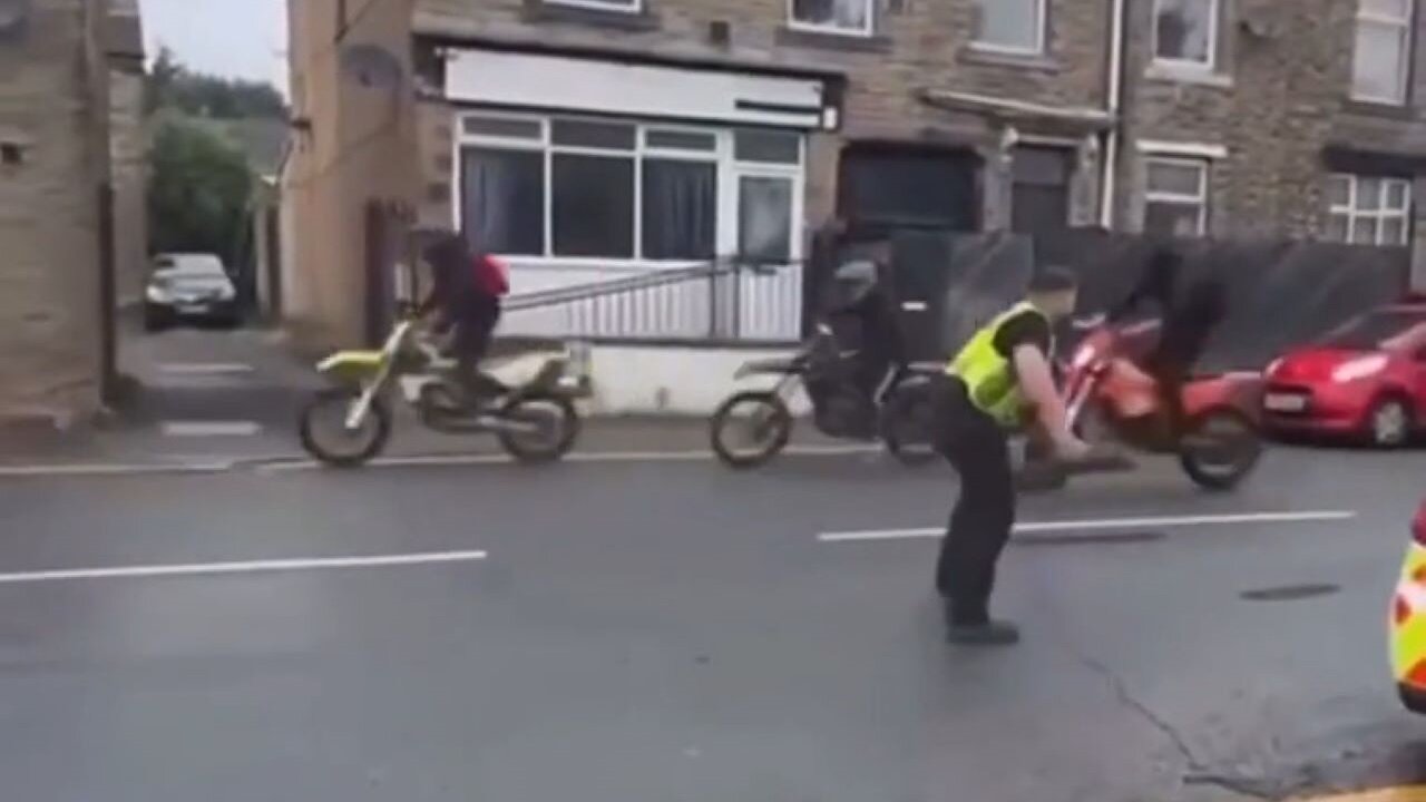 British Cop Tries To Stop A Bunch Of Punks On Motorbikes, Ends Up Getting Hit By A Quad
