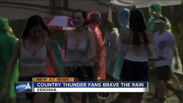 Country Thunder plays on despite heavy rains and flood threat