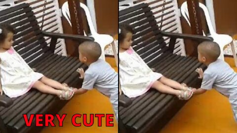 CHILD HELPING FRIEND TO SWING - CUTE CHILDREN