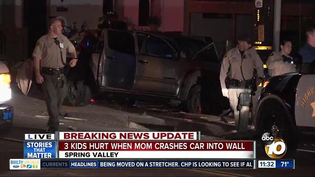 3 children hurt after mom crashes truck into wall