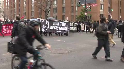 Violent protests erupt on Inauguration Day as people smash windows and destroy the city