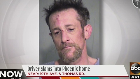 Mugshot released of driver who crashes into Phoenix home
