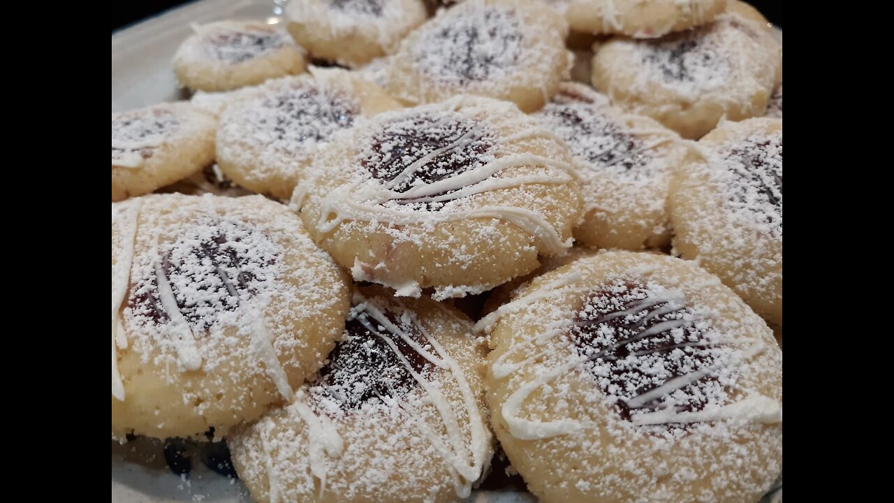 Easy Raspberry Thumb Print Cookies with White Chocolate Drizzle