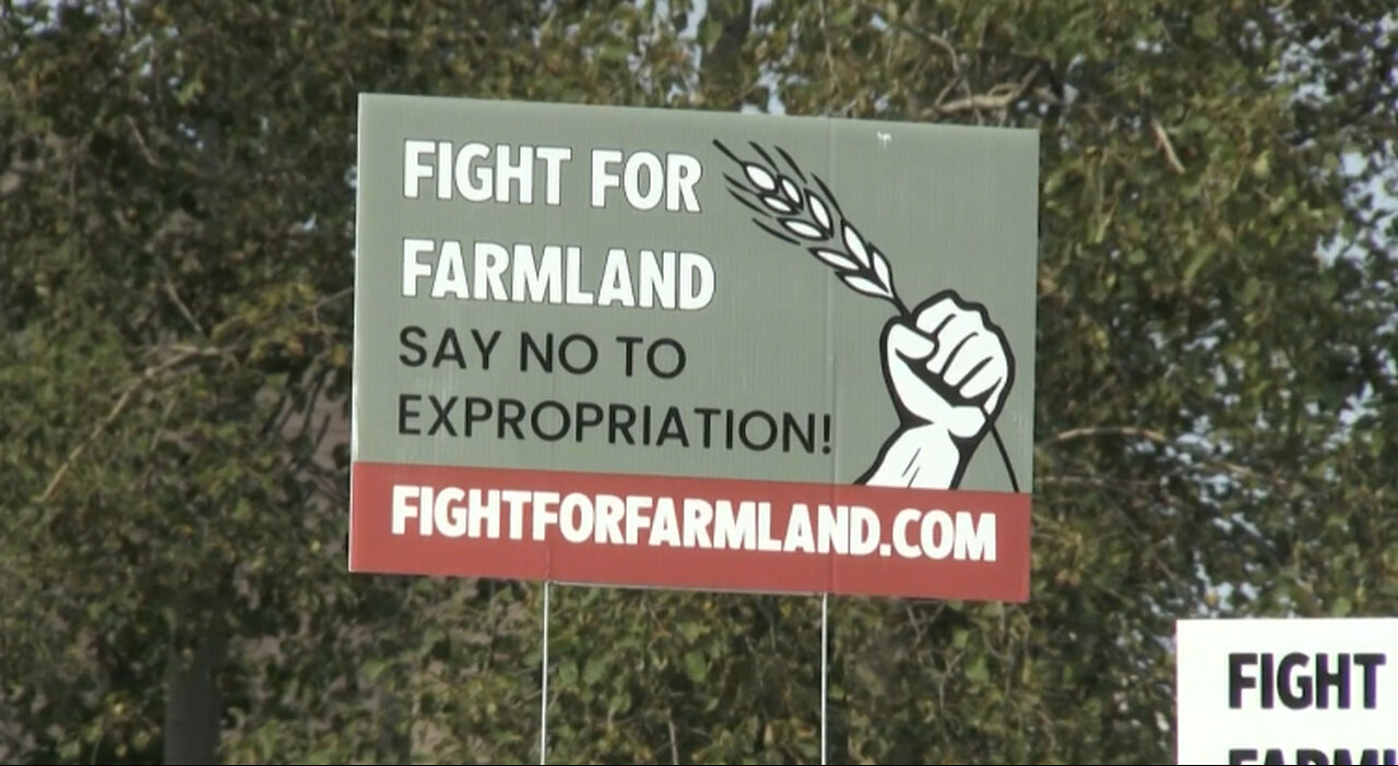 Protesting sale of Wilmot farmland