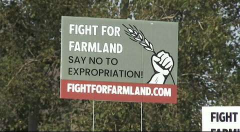 Protesting sale of Wilmot farmland