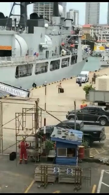 Footage of Sri Lanka's President fleeing on military ship from Colombo harbor.