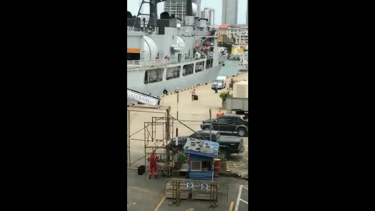 Footage of Sri Lanka's President fleeing on military ship from Colombo harbor.