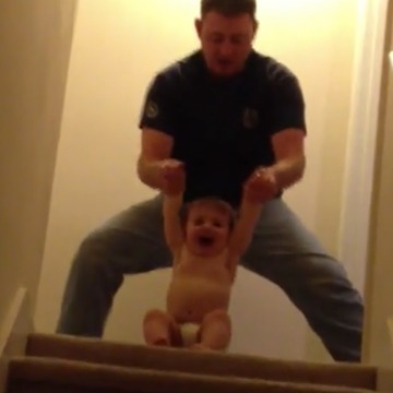 Dad Plays With His Toddler Making Martial Arts Sounds