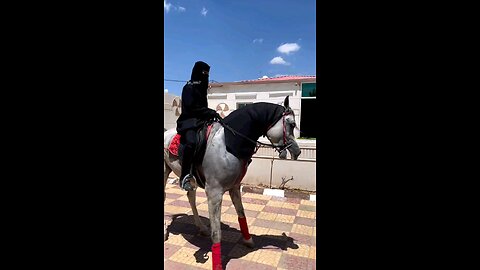 arab women riding horse